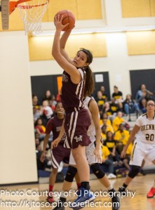 Versatile Highlands junior Emily Pearce shows her rebounding skills against Brennan.