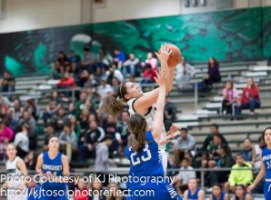 Southwest freshman post Melissa Lockridge powers past a Somerset defender to the basket. Lockridge scored seven points.