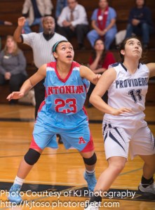 Providence freshman Christiana Howell (11) gets rebounding position against Antonian's Jazmin Howard (23).