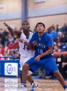 Lanier's Isaiah Vargas boxes out Jefferson's D'Andre Melton.