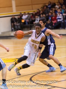 East Central senior point guard Ceddrick Ali turns the corner against South San. Ali scored 16 points on Senior Night.