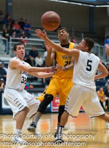 Jeremy Jones splits two O'Connor defenders.