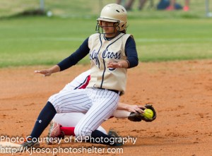 Knights senior pitcher Julia Ibarra beats the throw and arrives safely at second base.
