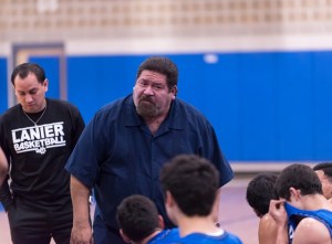 Joseph Martinez (left), who played on Lanier's 2000 and 2001 state teams, will succeed his mentor Rudy Bernal (right) as Lanier's boys basketball coach.