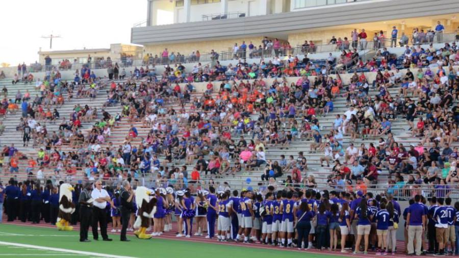 Brackenridge's contingent sings the school song at the Alamo Stadium re-dedication ceremony.
