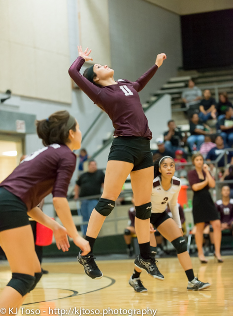 Highlands senior Emily Pearce makes a back row attack. Pearce made 18 digs against Southside. Libero Kiara Pesina (2) watches.