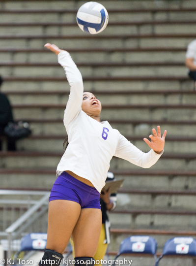 Brackenridge senior Jolicia Shelton-Brown serves against Burbank.