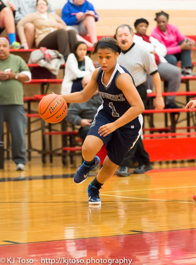 Providence's Imani Dunn-Lee looks for a driving lane against Fox Tech.