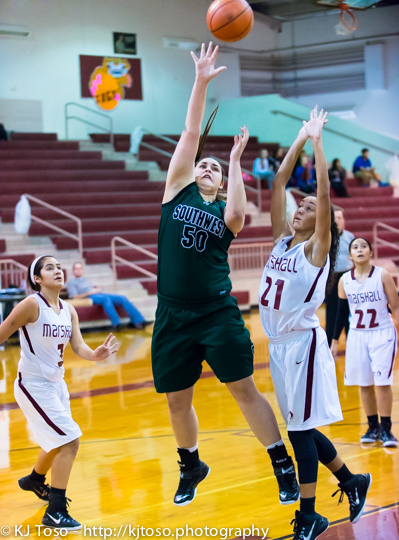 Southwest senior post Cheyenne Ortiz scores inside in an earlier game against Marshall.