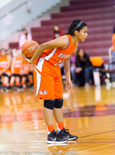 Bulldogs point guard Abigail Macias surveys the defense.
