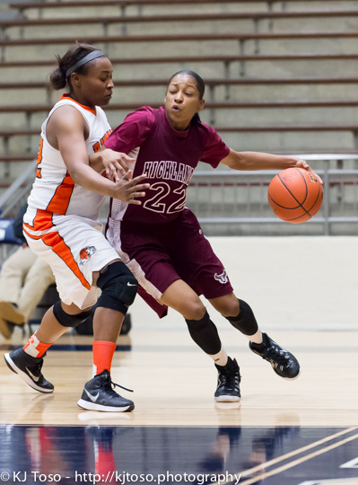 Highlands' Aaliyah Prince (22) makes a bid for the baseline against Burbank's Antwanisha Riddle.