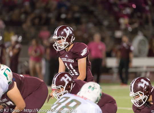 Highlands junior quarterback Dylan Camacho (11) surveys the defense.