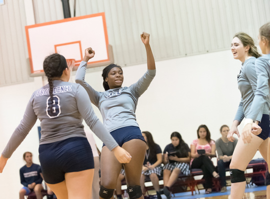 Providence players react to a point.