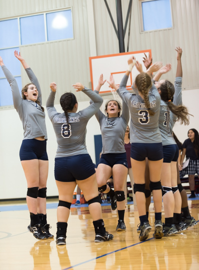 Providence celebrates an 18-25, 25013, 25-19, 25-17 comeback victory over Cornerstone Christian.